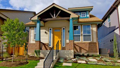 Craftsman home with yellow door in Crestview, Central Austin